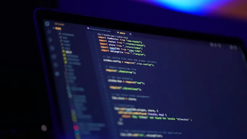 A close-up of programming code on a laptop screen